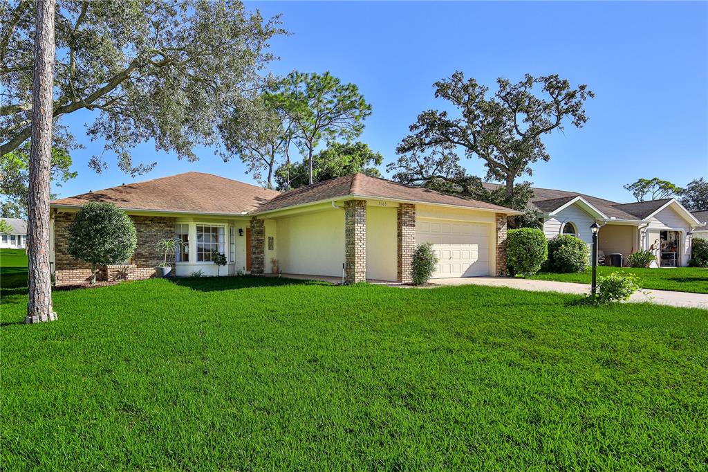 7103 CROWN OAKS DRIVE, SPRING HILL, FL — photo 4 of 75