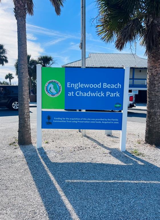 A sign for Englewood Beach at Chadwick Park stands between two palm trees — 2819 DIXIE DRIVE, PUNTA GORDA, FL