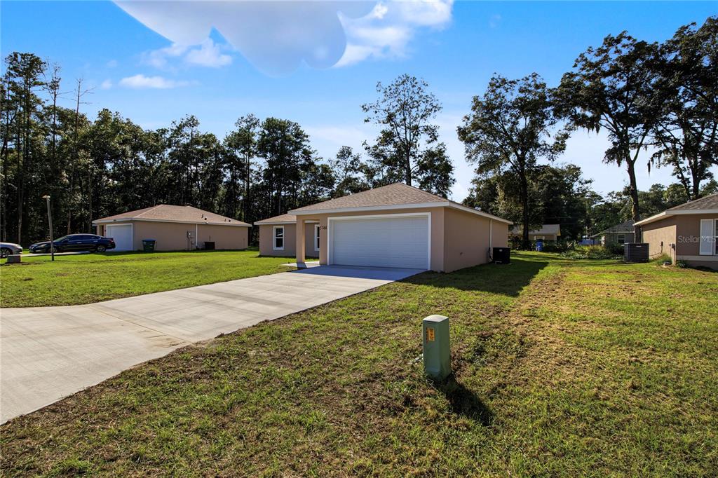 5744 NW 61ST AVENUE, OCALA, FL — photo 2 of 44