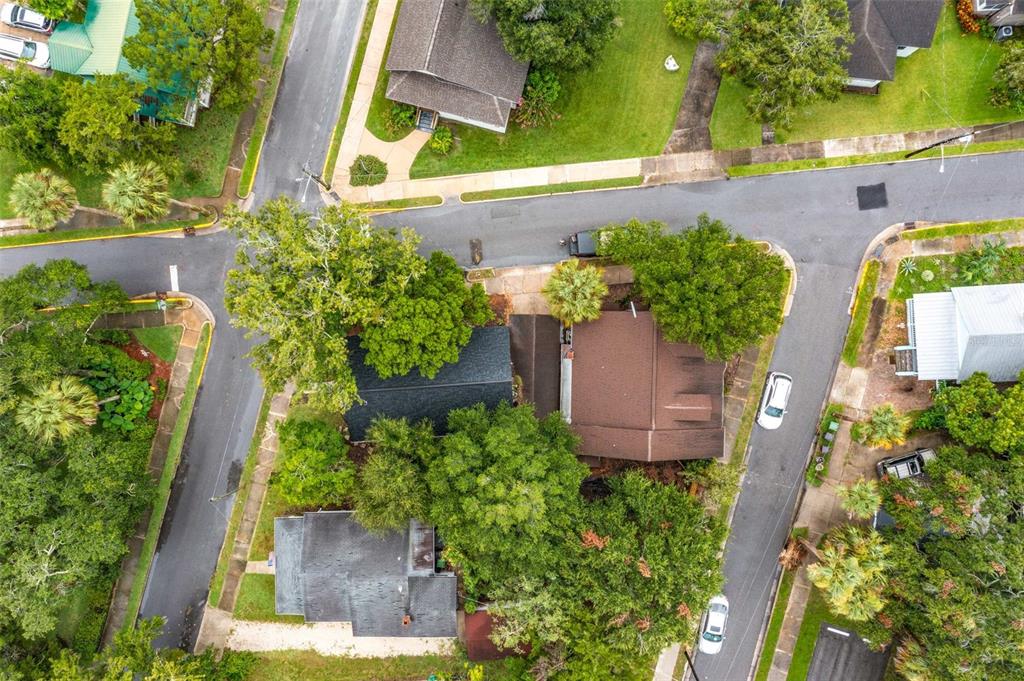 An aerial view shows houses, streets, and trees in a residential neighborhood — 10 PACIFIC STREET, ST AUGUSTINE, FL