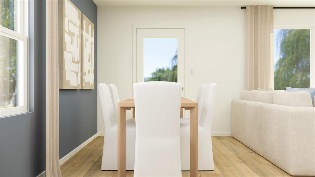 This is a rendering of a dining area featuring a wooden table and white chairs — 2930 CHERRY LANE, HAINES CITY, FL