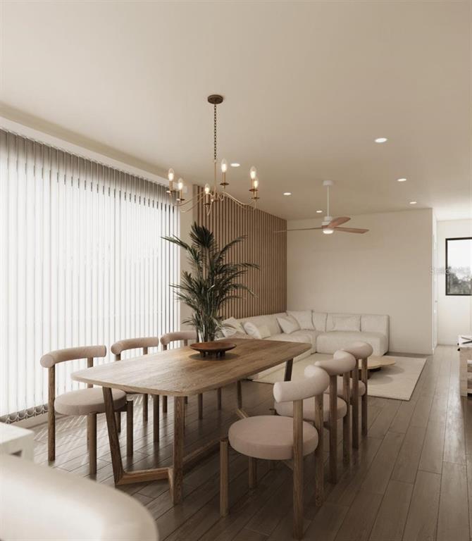 This rendering shows a dining area with a wooden table and chairs beside a living room — 2168 9TH AVENUE N UNIT 3, ST PETERSBURG, FL