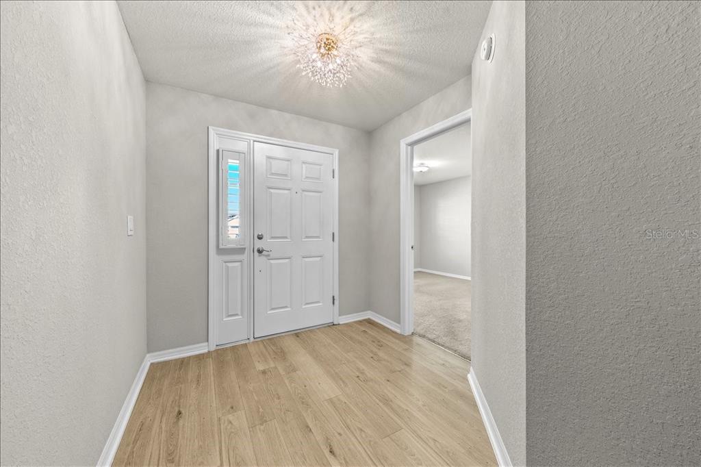 1041 MONTGOMERY LANE, POLK CITY, FL — photo 4 of 70
