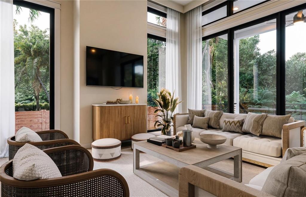 A modern living room features a wall-mounted television, a wooden console, and floor-to-ceiling windows — 4183 ROBERTS POINT CIRCLE LOT 18, SARASOTA, FL