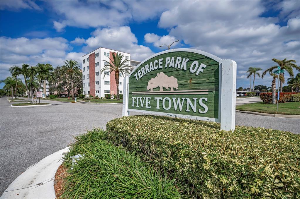 A sign for Terrace Park of Five Towns stands in front of a residential building — 5501 80TH STREET N UNIT 405, ST PETERSBURG, FL