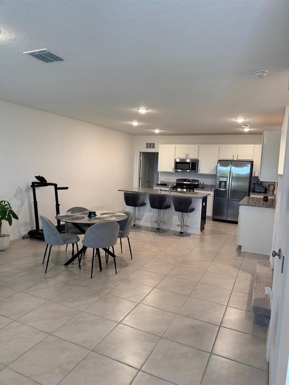 15134 WINDFLOWER ALLEY, WINTER GARDEN, FL — photo 3 of 19