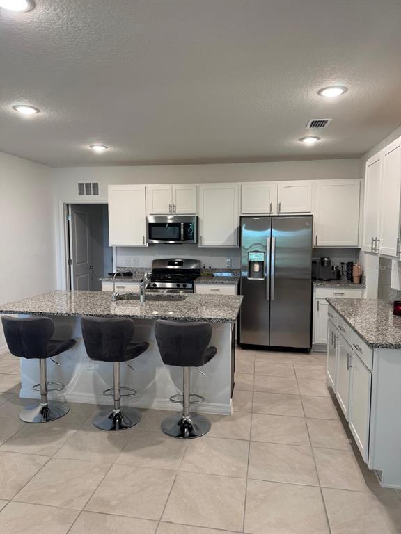 15134 WINDFLOWER ALLEY, WINTER GARDEN, FL — photo 5 of 19