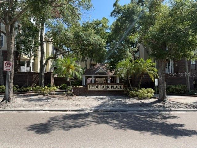 The exterior of the Hyde Park Place apartment complex features a brick entrance sign — 1000 W HORATIO STREET UNIT 226, TAMPA, FL