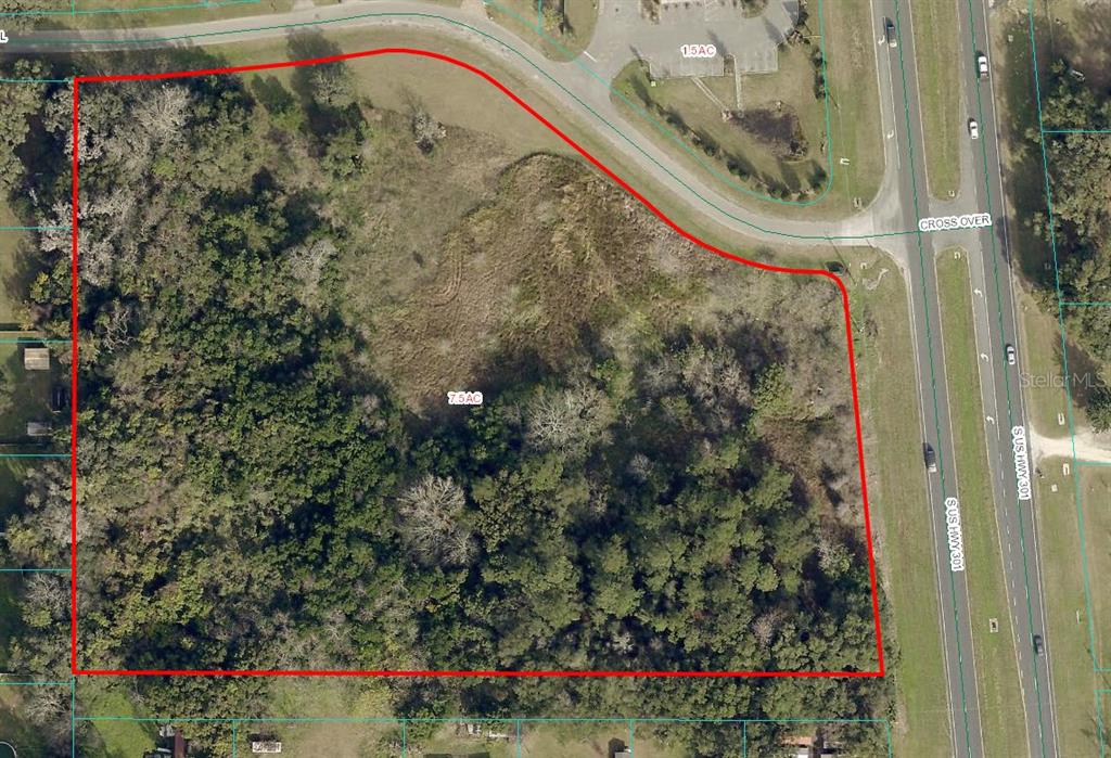 An aerial map shows a 7.5-acre plot of land outlined in red next to a highway — US HWY 301, BELLEVIEW, FL