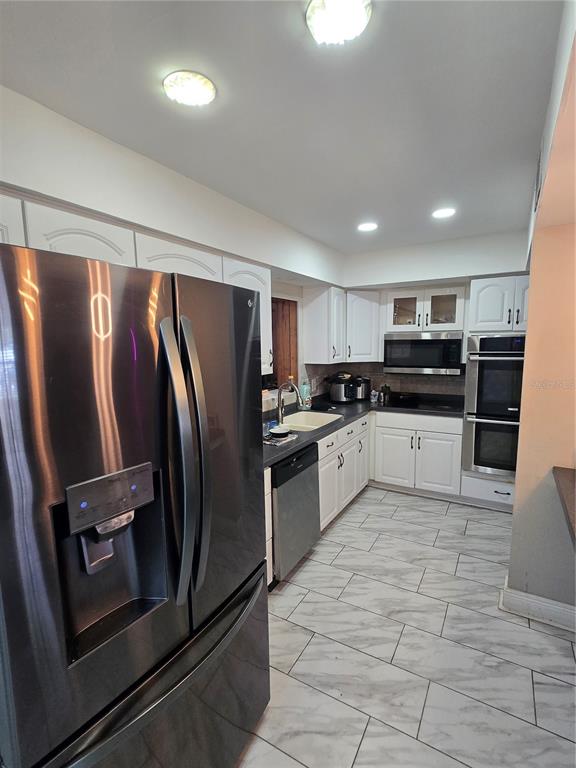 7710 W HANNA AVENUE, TAMPA, FL — photo 5 of 24