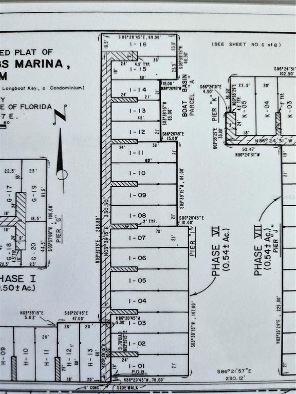 This is a survey plat map showing the layout and dimensions of marina boat slips — 2600 HARBOURSIDE DRIVE UNIT I-12, LONGBOAT KEY, FL