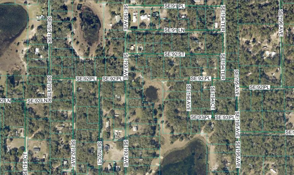 This is an aerial map showing property lot lines and street names in a wooded area — 00 SE 92ND PLACE, OCKLAWAHA, FL