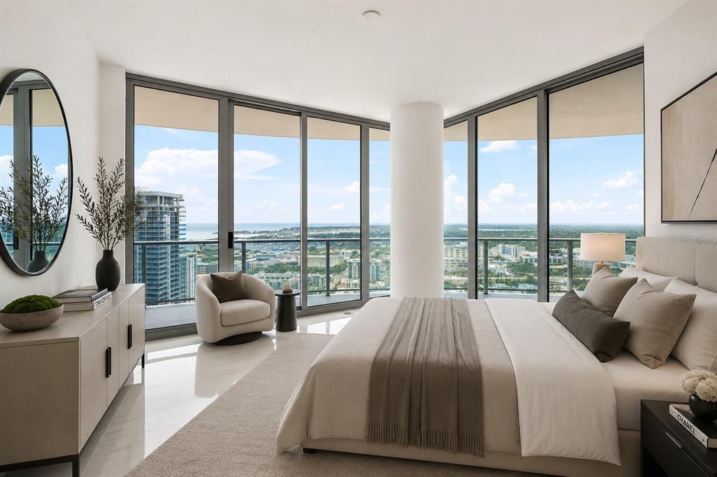 An open-concept living area with white tile floors, a modern kitchen, and floor-to-ceiling windows — 400 CENTRAL AVENUE UNIT 2901, ST PETERSBURG, FL