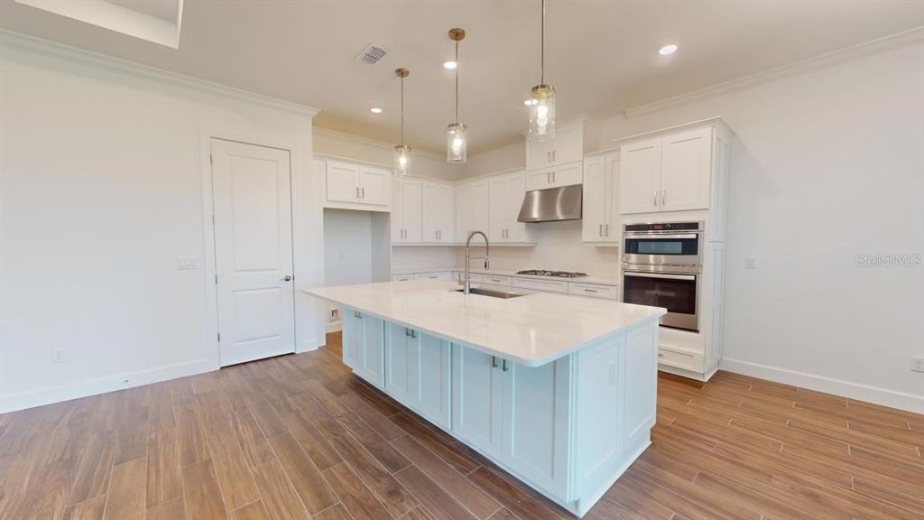This is a floor plan for a single-story house with two bedrooms, a study, and garage — 30175 IMPERATI BOULEVARD, WESLEY CHAPEL, FL