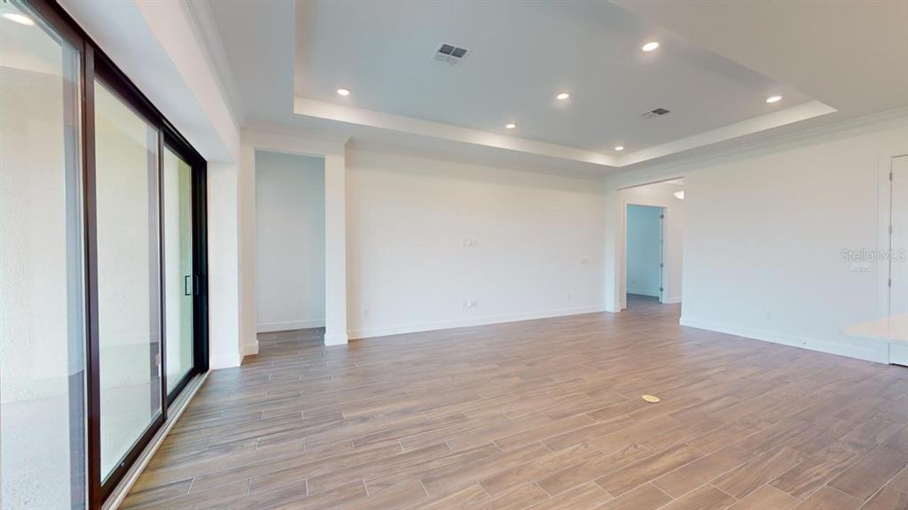 This image displays a design selection board featuring various tile, countertop, and cabinet finish samples — 30175 IMPERATI BOULEVARD, WESLEY CHAPEL, FL