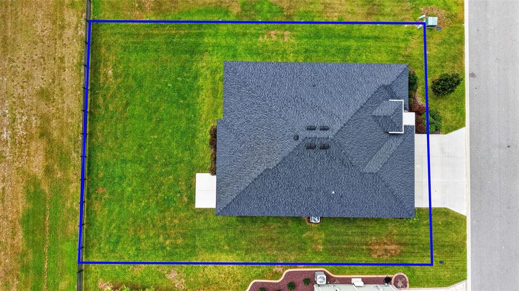 654 SHIVERS LOOP, THE VILLAGES, FL — photo 2 of 62