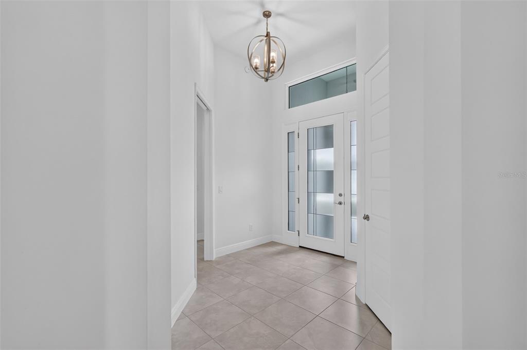 654 SHIVERS LOOP, THE VILLAGES, FL — photo 4 of 62