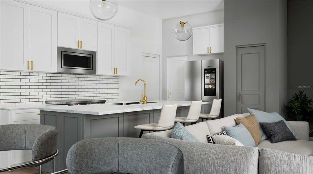 This rendering shows a modern kitchen with white cabinets, a gray island, and an adjacent sofa — 12408 BATFISH COURT, PLACIDA, FL