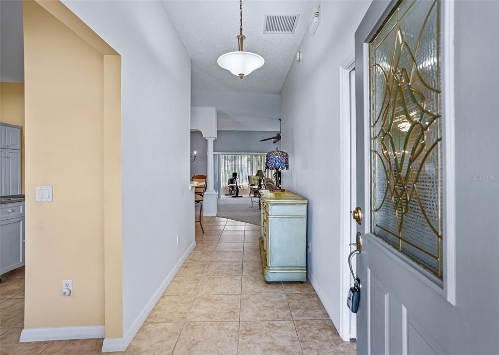1857 POPPY CIRCLE, THE VILLAGES, FL — photo 4 of 30