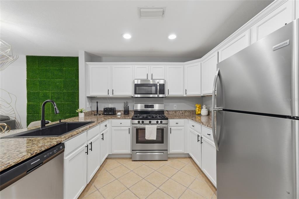 1310 SEVEN EAGLES COURT UNIT 202, REUNION, FL — photo 5 of 25