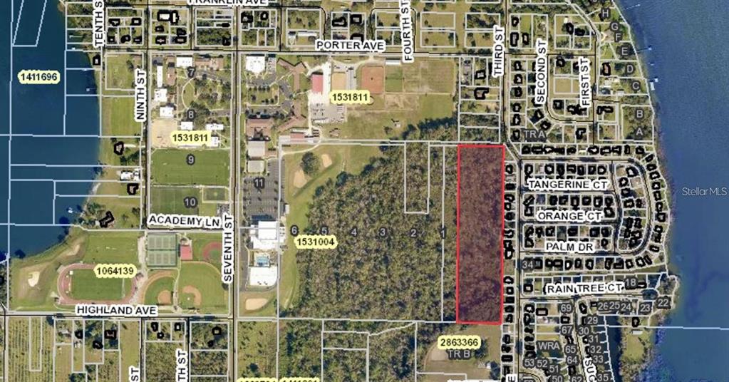 This is an aerial map showing a rectangular parcel of land highlighted in red — 3RD ST, MONTVERDE, FL