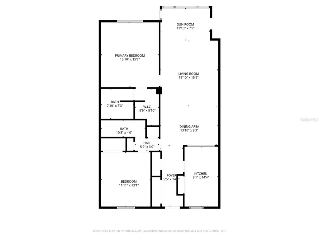This is a floor plan of a two-bedroom, two-bathroom apartment with a sunroom — 1776 6TH STREET NW UNIT 409, WINTER HAVEN, FL