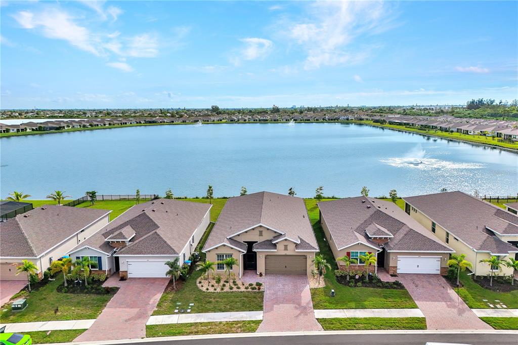 447 SPRING HILL LAKE LOOP, CAPE CORAL, FL — photo 2 of 30