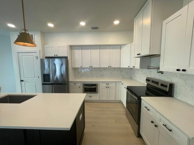 6315 S RICHARD AVENUE, TAMPA, FL — photo 5 of 30