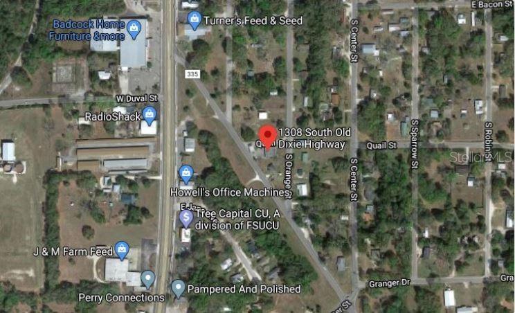 This is a satellite map view showing a property location and surrounding streets and businesses — 1308 S DIXIE HIGHWAY, PERRY, FL