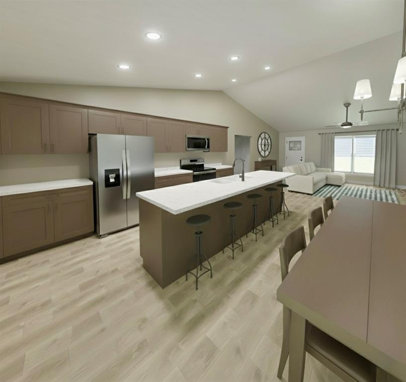 This is a digital rendering of an open-concept kitchen with brown cabinets and a central island — 50 BAY DRIVE, OCKLAWAHA, FL