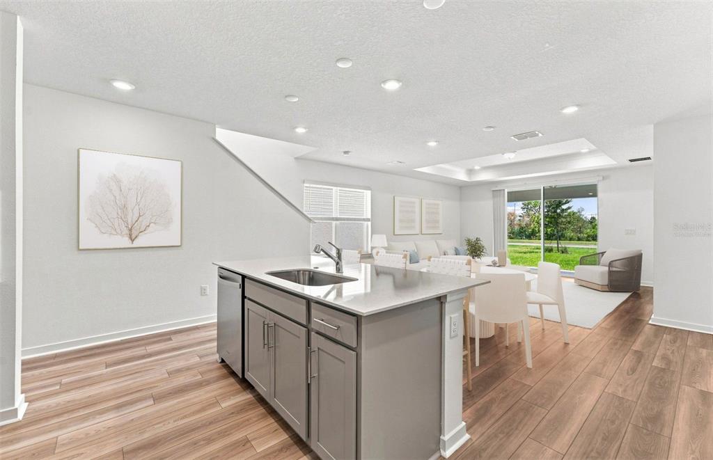 This image displays a design board for a home interior package featuring neutral-toned finishes — 7923 PALM PARADISE PLACE, PARRISH, FL