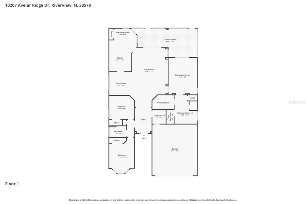 A concrete walkway leads to a covered entryway with a green front door — 10207 AVELAR RIDGE DRIVE, RIVERVIEW, FL