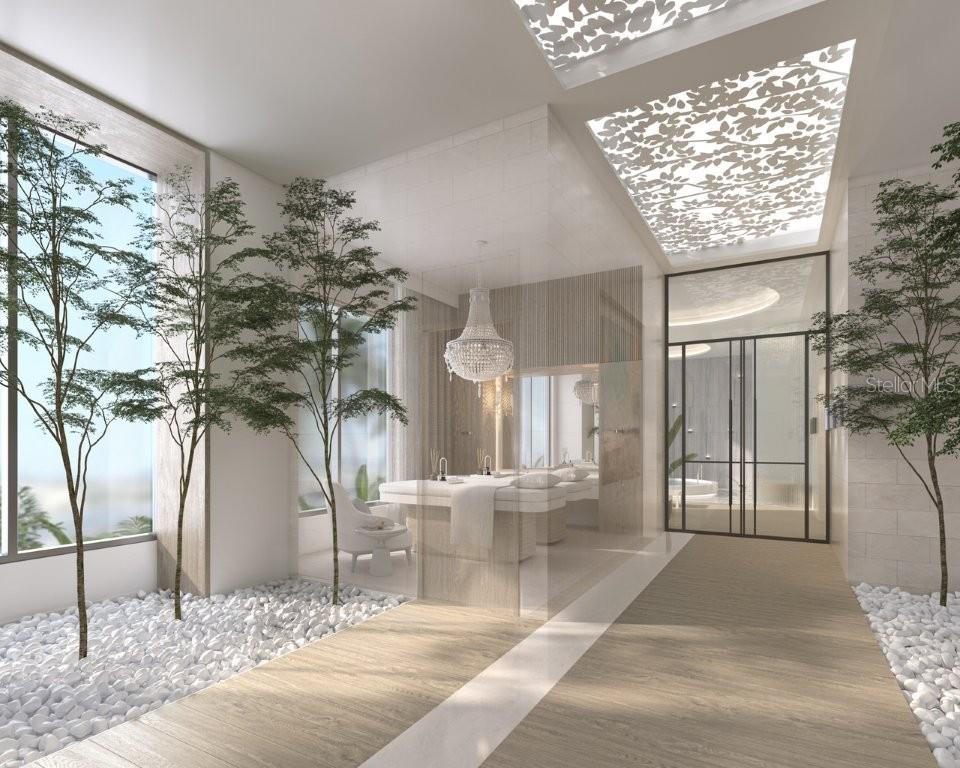 This architectural rendering shows a spa room with massage tables, indoor trees, and decorative lighting — 555 QUAY COMMONS UNIT 1903, SARASOTA, FL