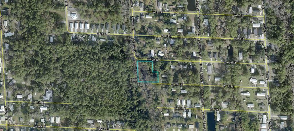 This is an aerial map showing a vacant, wooded lot outlined in blue — 850 S VOLUSIA STREET, ST AUGUSTINE, FL