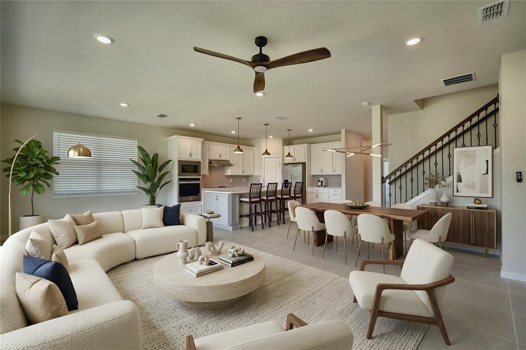 A view from inside a room through large sliding glass doors onto a paved patio — 6030 ARBOR WATCH LOOP, ORLANDO, FL