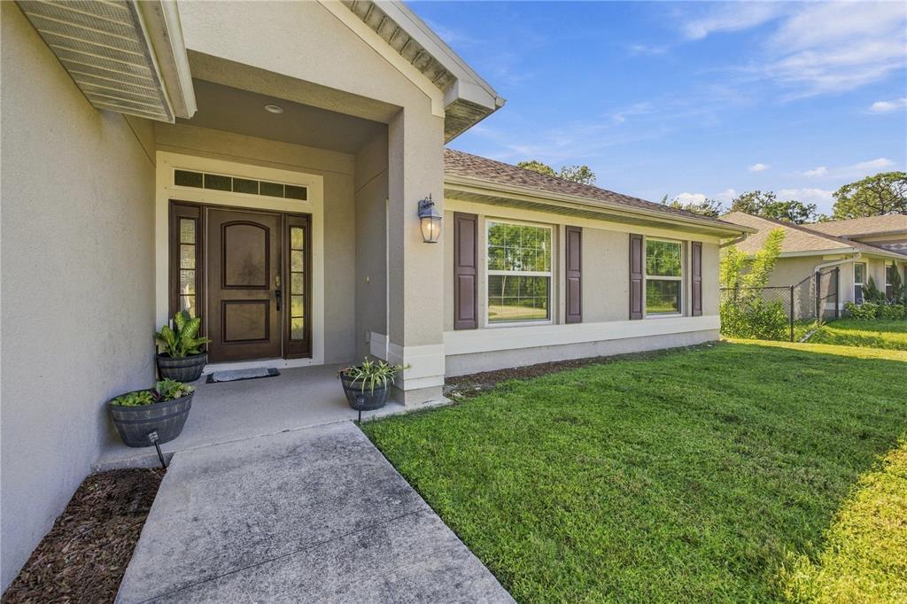 1822 YOAKUM STREET, LEHIGH ACRES, FL — photo 2 of 24