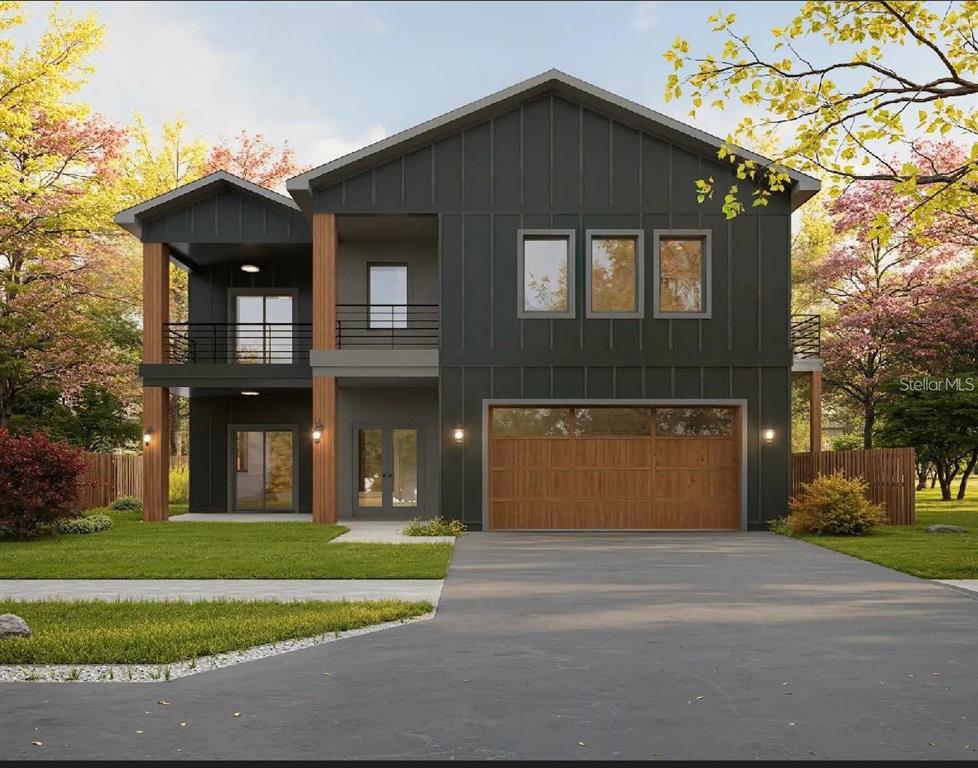 A digital rendering of a two-story modern farmhouse with dark vertical siding and wood accents — 849 S SHADE AVENUE, SARASOTA, FL