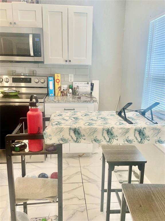 1117 AVENUE H, HAINES CITY, FL — photo 4 of 6
