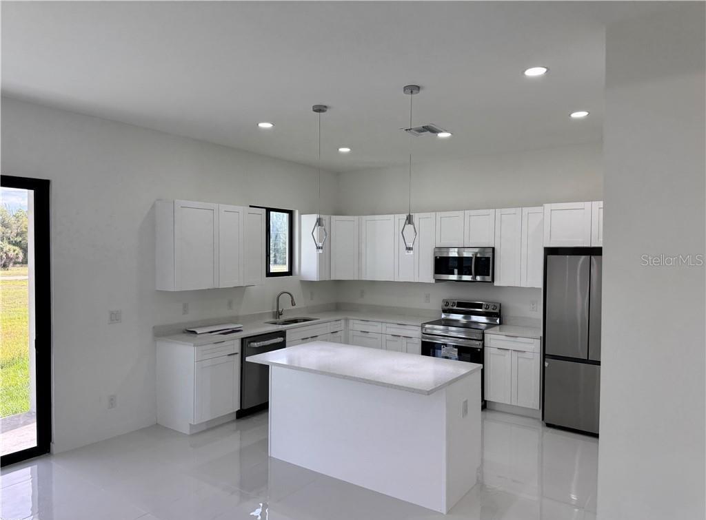 4121 NW 22ND STREET, CAPE CORAL, FL — photo 5 of 24