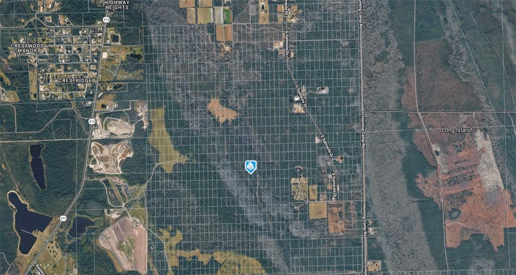 This is an aerial map showing a plot of land marked with a blue icon — 0 SAMSULA DR, NEW SMYRNA BEACH, FL