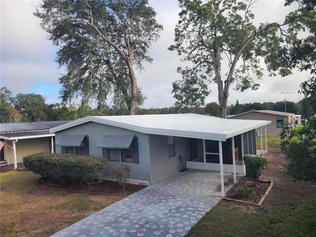 710 COACHMAN DRIVE, LEESBURG, FL — photo 2 of 22