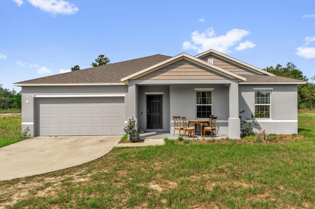 123 ZINNIA LANE W