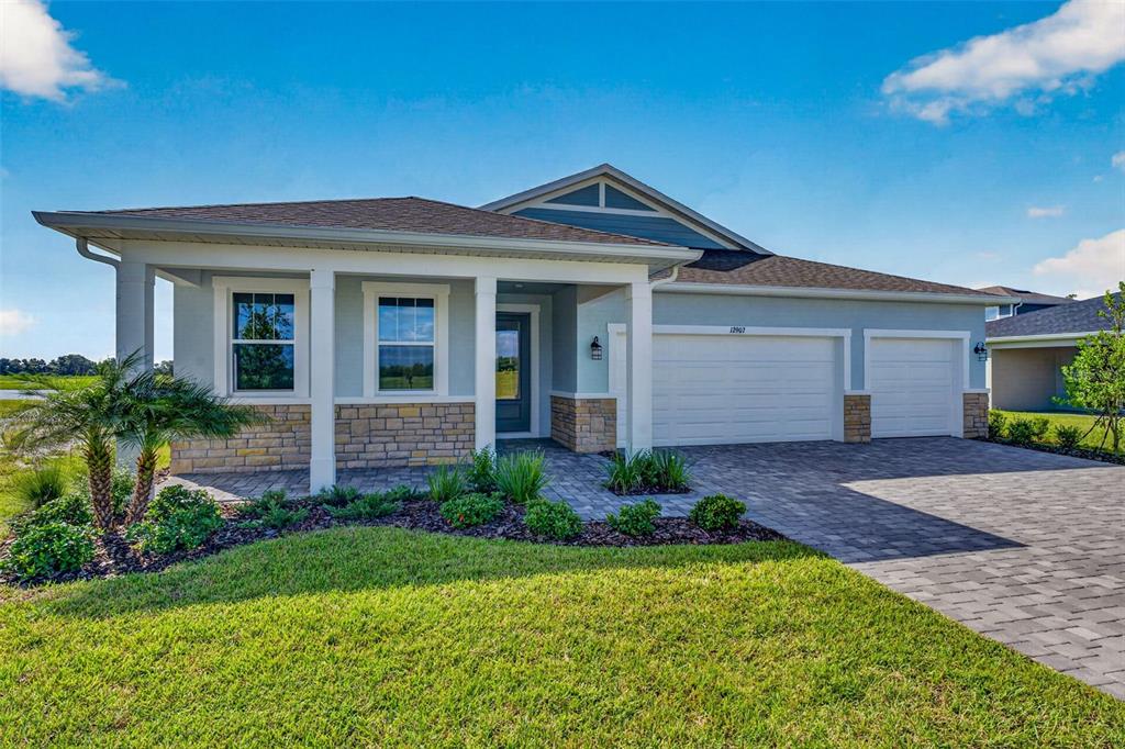 This is a floor plan for a single-story house with a three-car garage — 12907 PIERCE STREET, PARRISH, FL