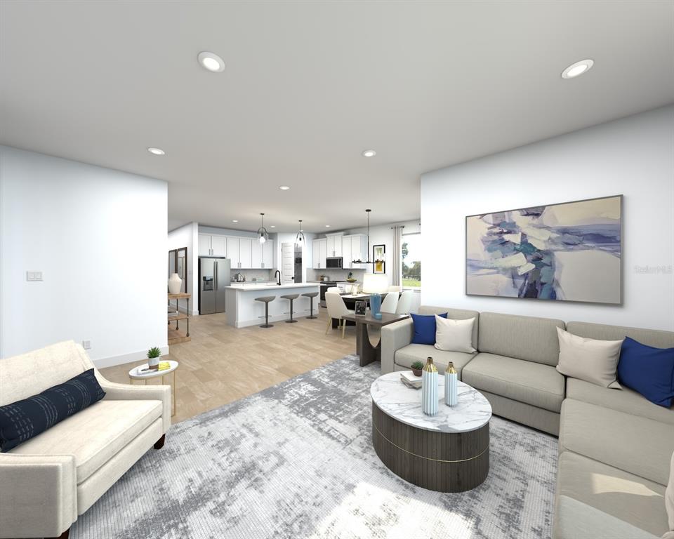 This is a digital rendering of an open-concept living room and kitchen with light flooring — 13138 SHELLMORE AVENUE, PALMETTO, FL