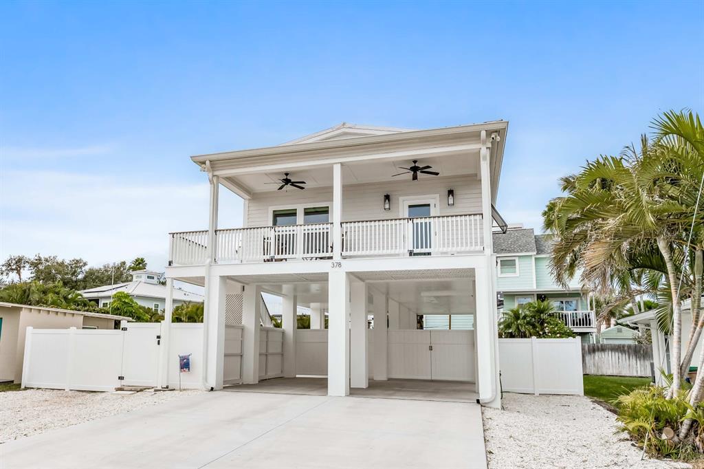 This is a floor plan for a three-bedroom, 2.5-bathroom home named Salt Cove — 108 125TH AVENUE, TREASURE ISLAND, FL