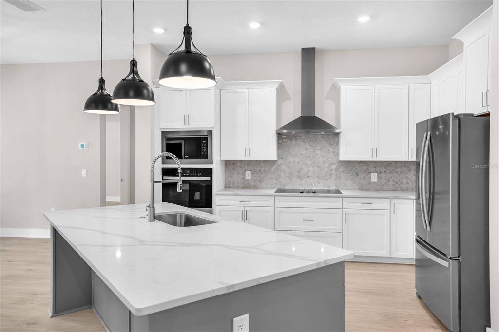 This floor plan shows a second level featuring a game room, media room, and bathroom — 13510 HAFLINGER WAY, HUDSON, FL