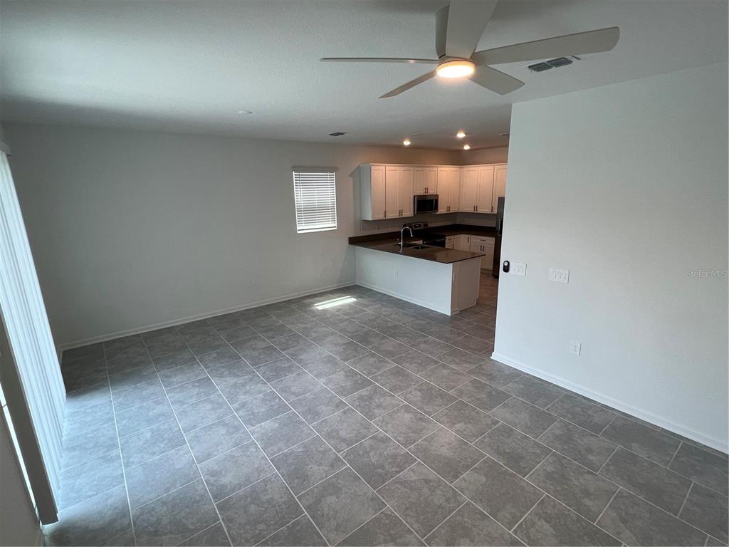 7497 STONE CREEK TRAIL, KISSIMMEE, FL — photo 2 of 18