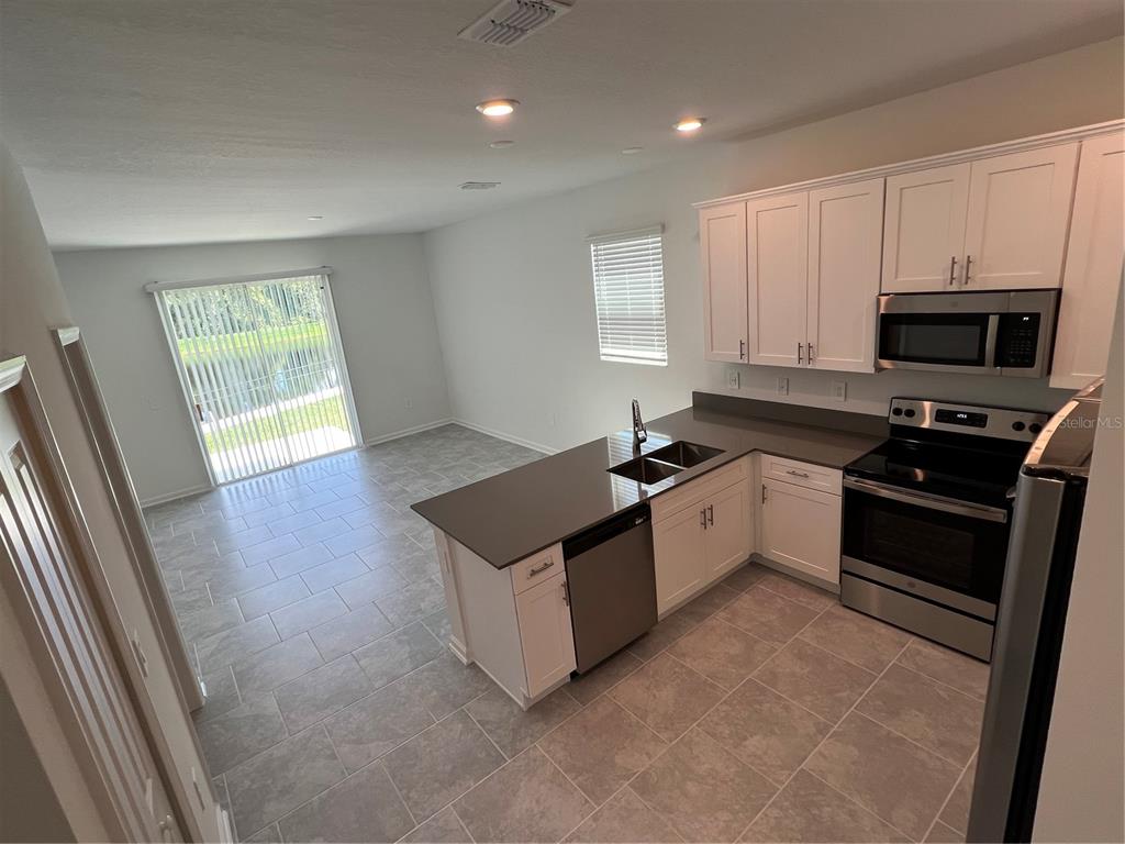 7497 STONE CREEK TRAIL, KISSIMMEE, FL — photo 5 of 18