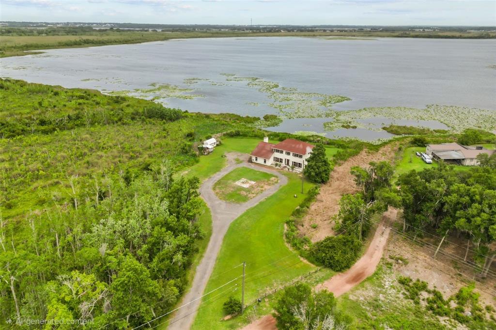A two-story house with a pool enclosure and a large grassy yard — 3101 LAKE LOWERY ROAD, HAINES CITY, FL