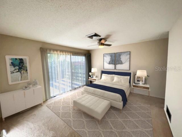 This bedroom features a bed with a blue runner, a white dresser, and sliding doors — 1210 CASEY KEY ROAD, NOKOMIS, FL